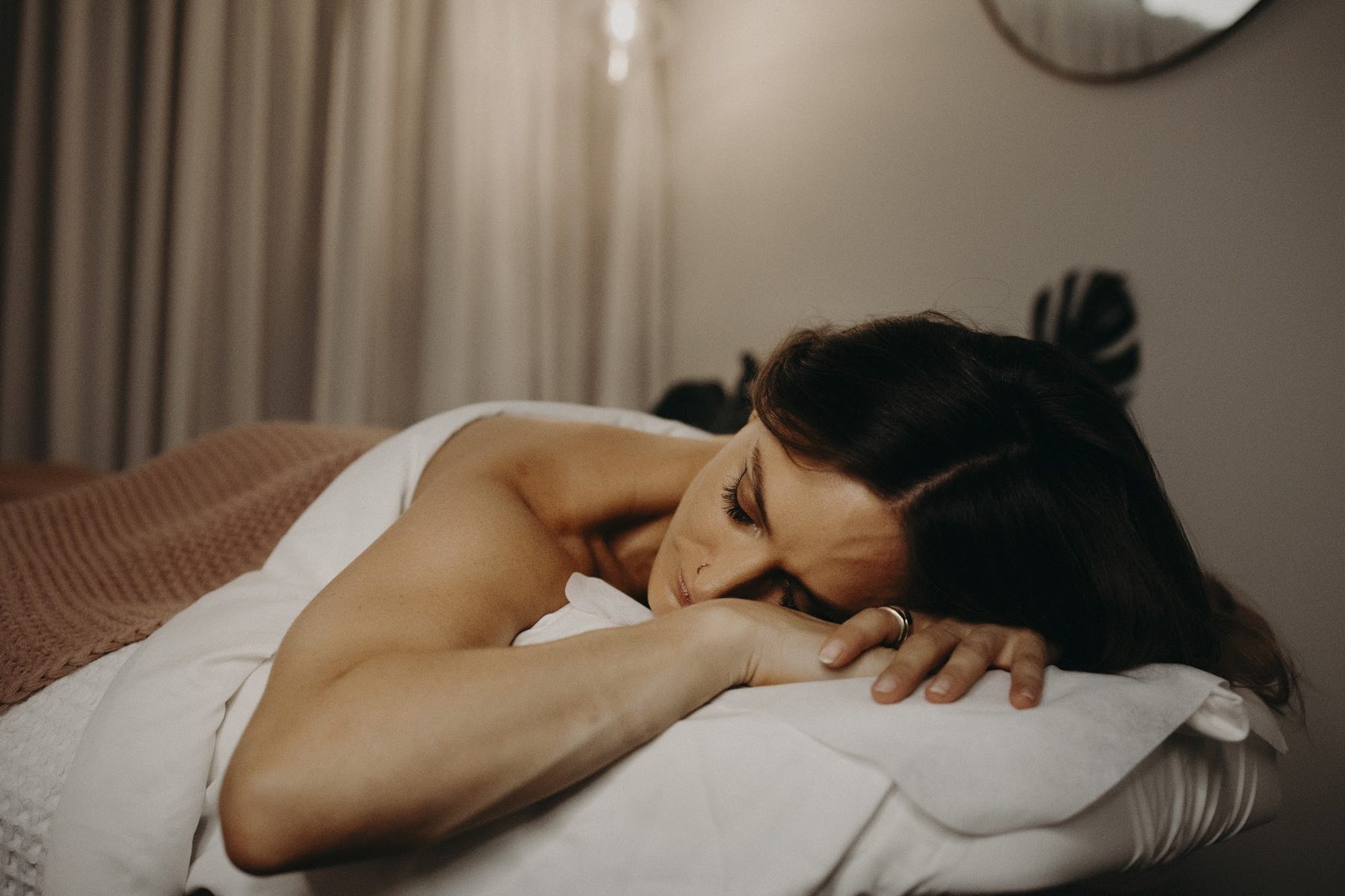 Client resting on her arms | Glow Skin & Spa, Baldivis